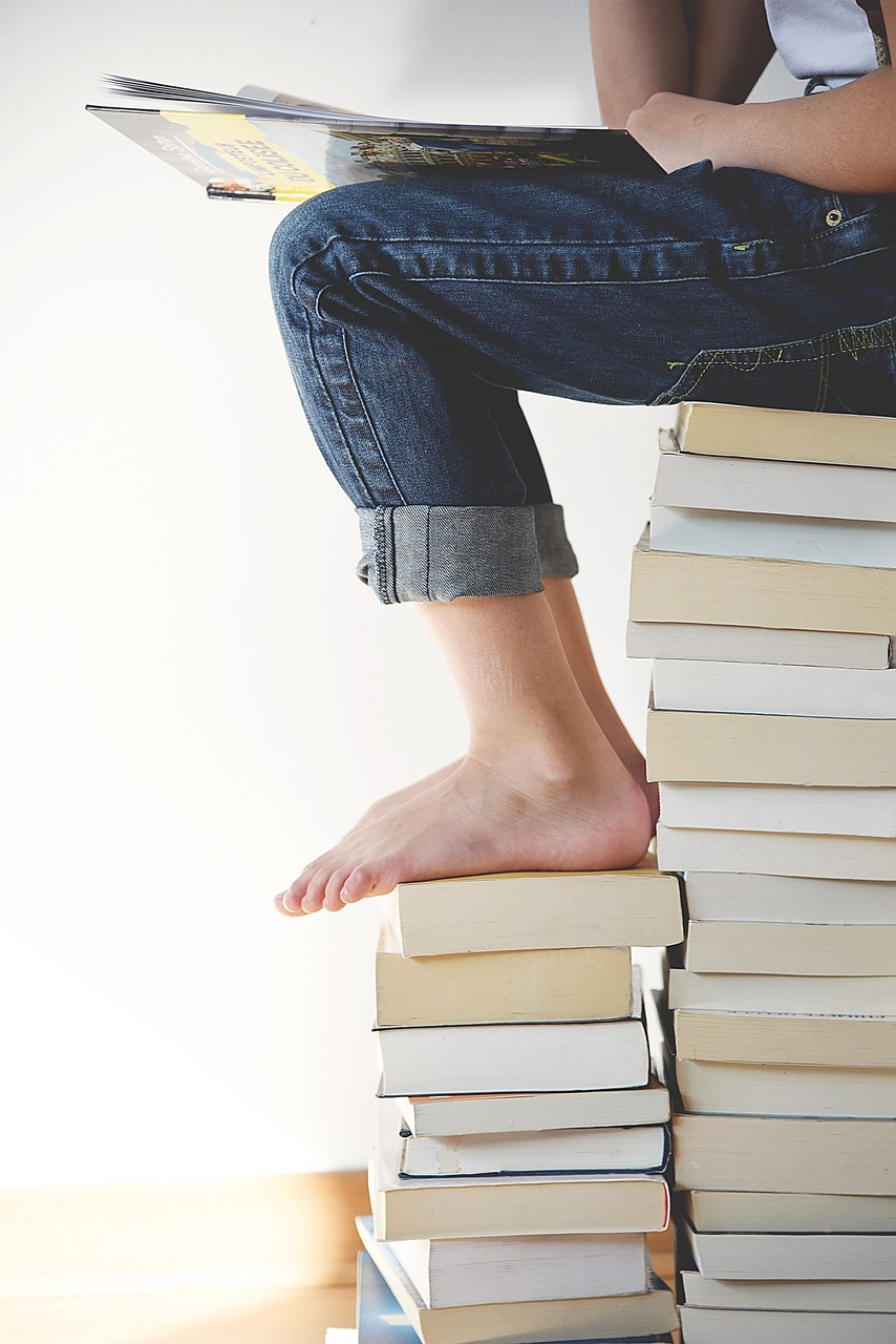 books, feet, legs, person, reading, study, learning, sitting, knowledge, stack, stack of books, books, books, reading, reading, reading, study, study, learning, learning, learning, learning, learning, knowledge